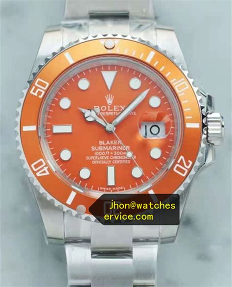 rolex submariner orange hand|Rolex Submariner wrist watch.